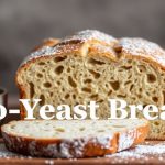 No-Yeast Bread loaves cooling on rustic wooden board, golden crust and soft crumb